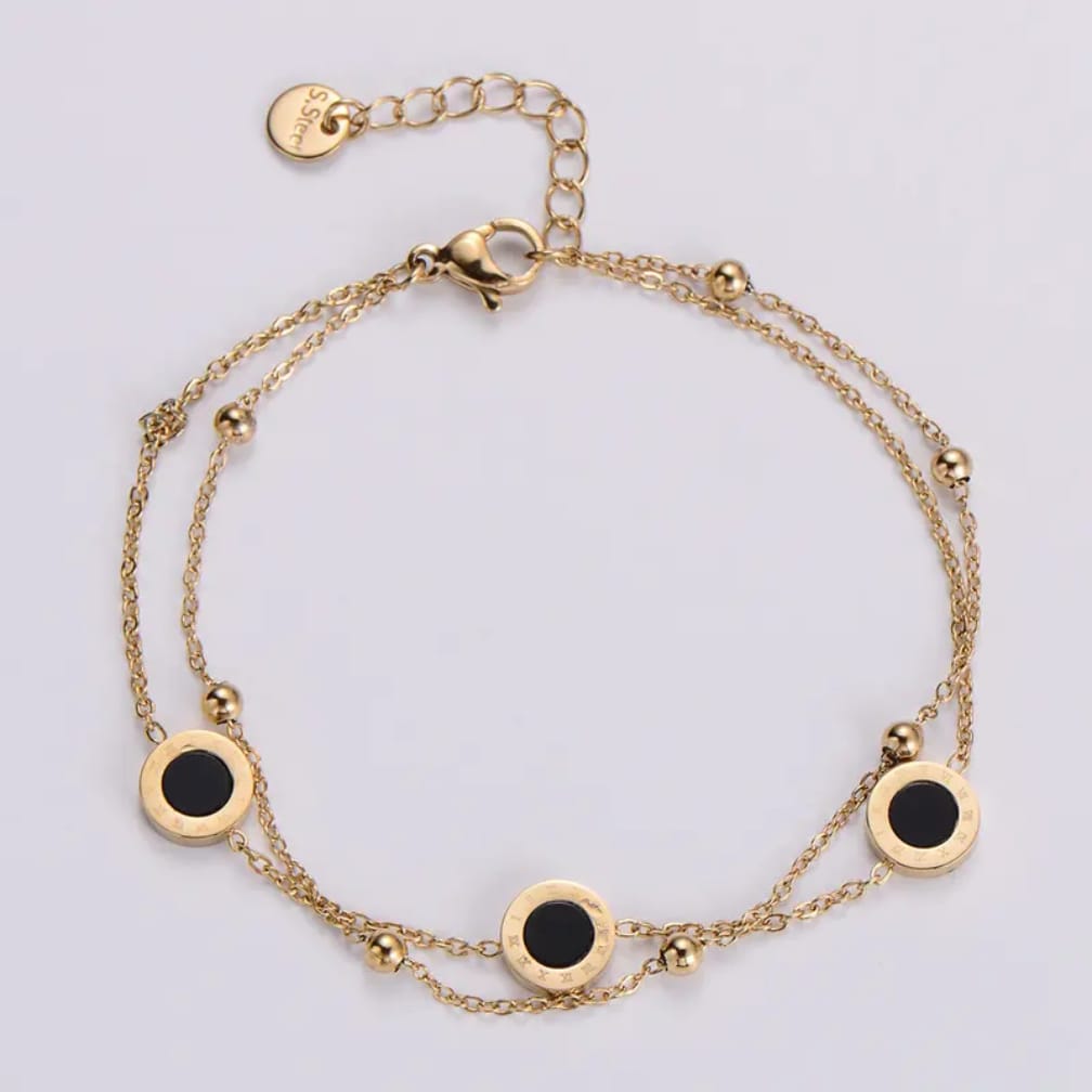 Stainless Steel Bracelet with Black Circular Charms