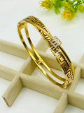 Gold Handcuff Bracelet with Intricate Design