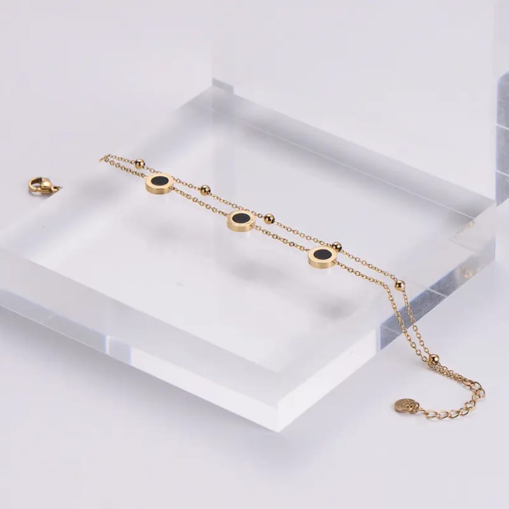 Stainless Steel Bracelet with Black Circular Charms