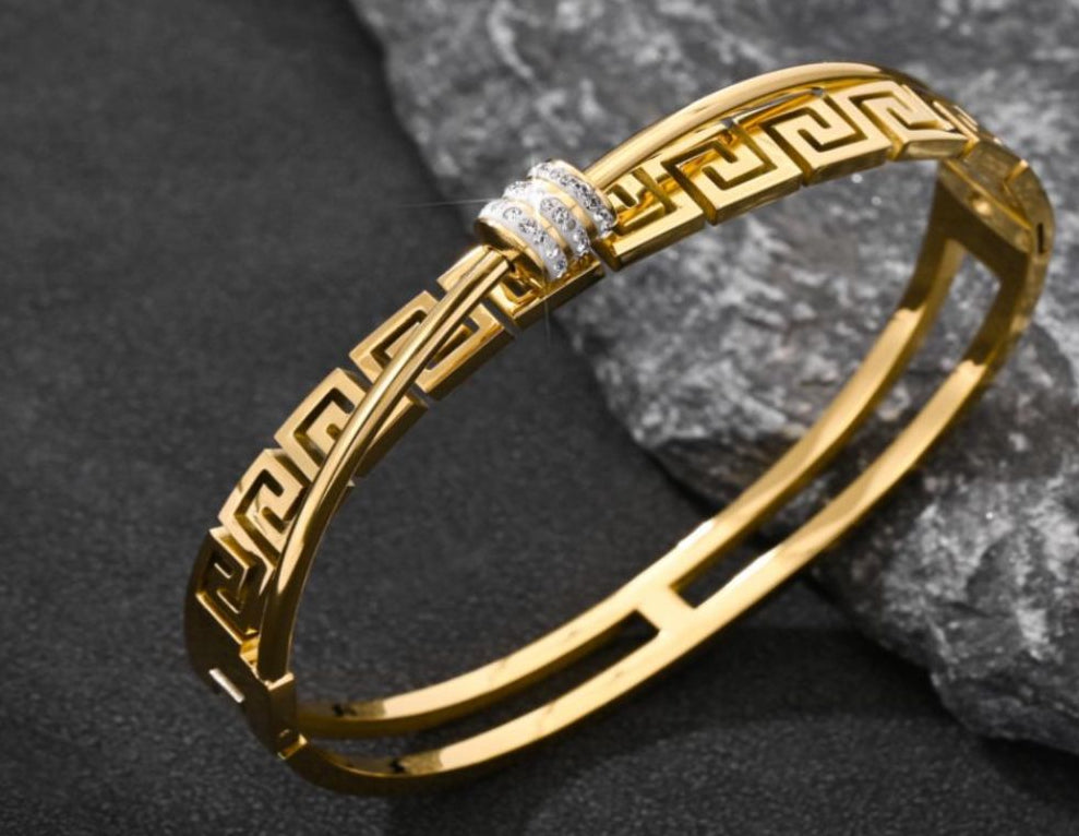Gold Handcuff Bracelet with Intricate Design