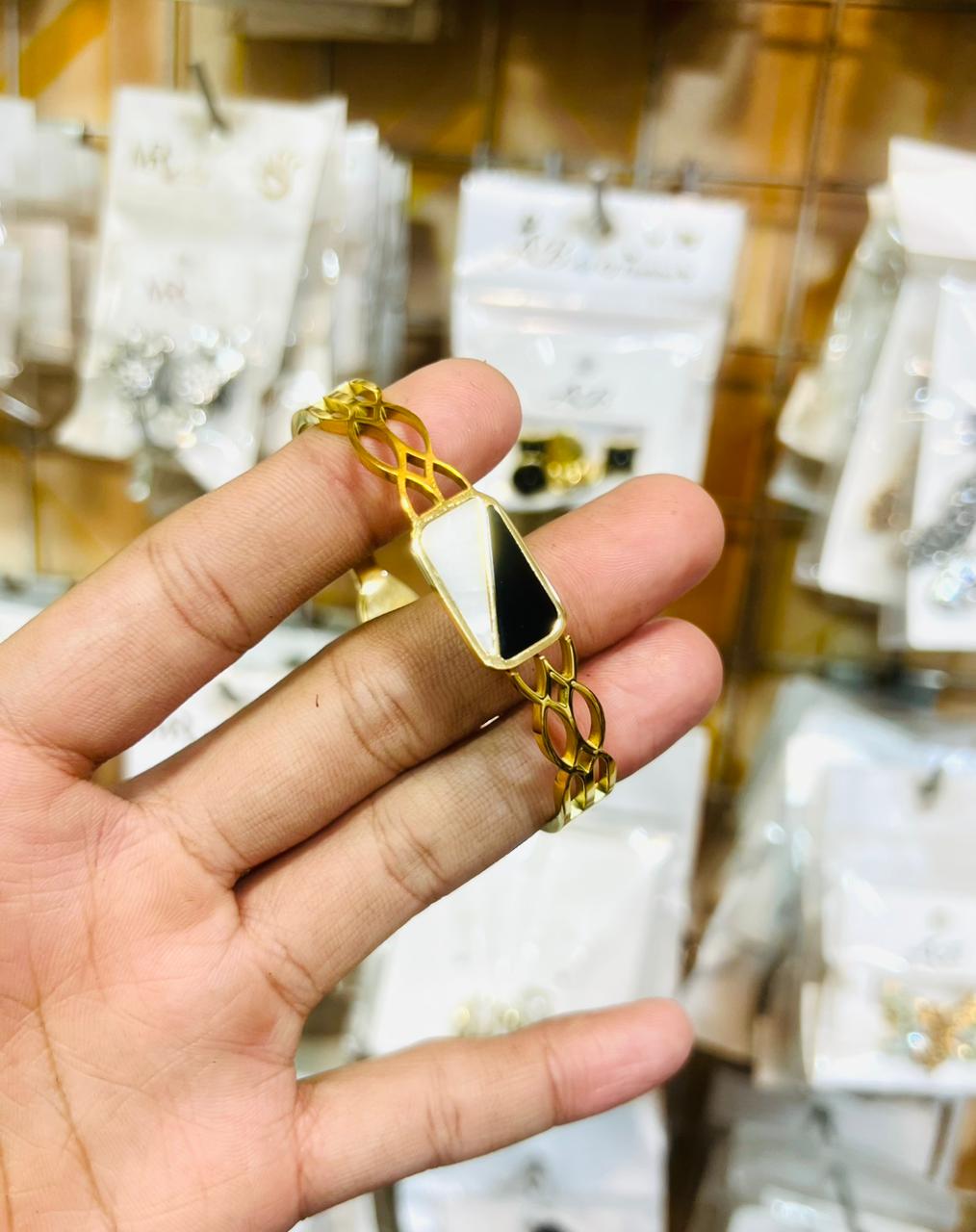 Gold Bracelet with Black & White accent