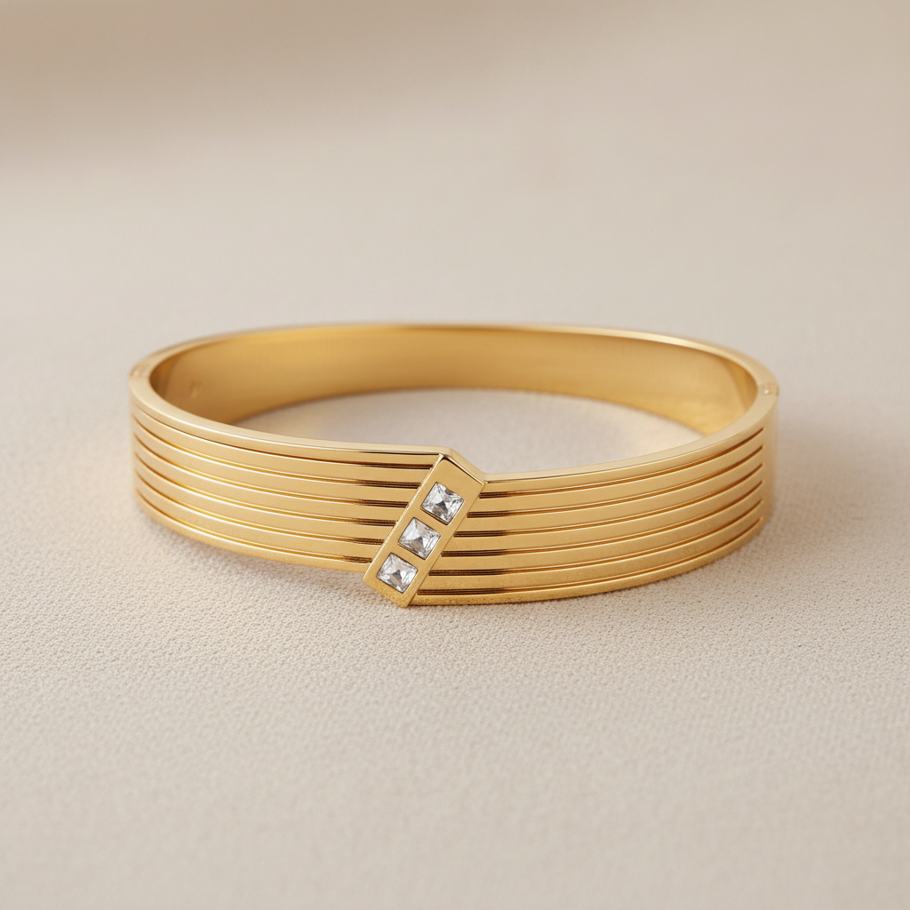 Gold Cuff Bracelet with Ridged Texture and Crystal Accent