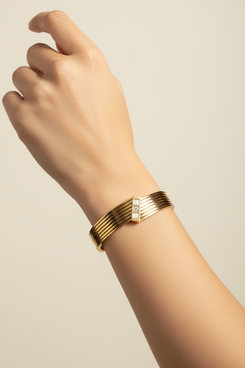 Gold Cuff Bracelet with Ridged Texture and Crystal Accent